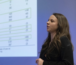 Liberty University osteopathic medical student presents research findings inside Liberty University College of Osteopathic Medicine.