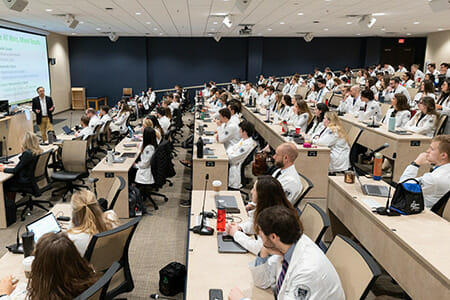 Dr. James Avery speaks to Liberty University osteopathic medical students as part of their Humanities and Medical Ethics II (HME II) prior to the LUCOM Medical Library symposium on March 1, 2022.