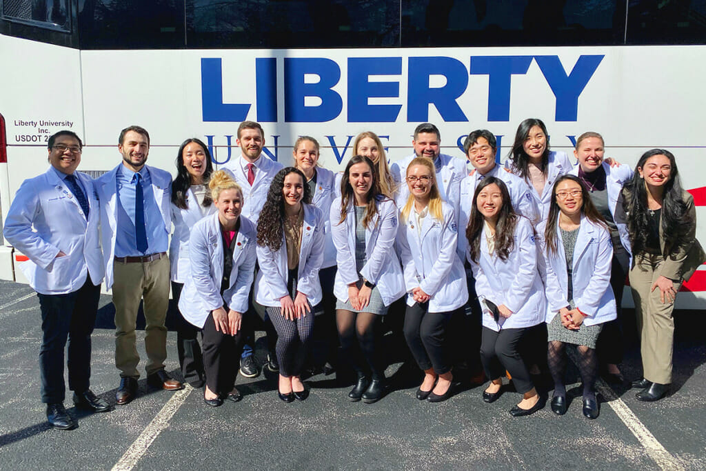 Liberty University osteopathic medical students pictured outside during the annual Edward Via College of Osteopathic Medicine (VCOM) Research Recognition Day, on Feb. 25.