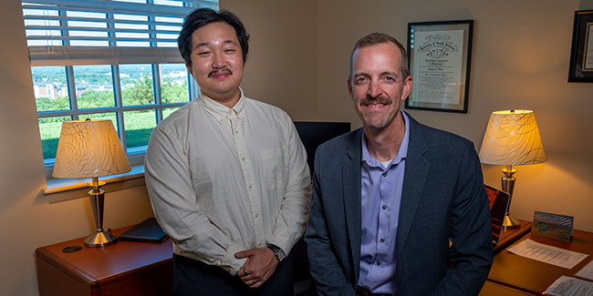 LUCOM Research Fellow Harold Shin, Class of 2025, pictured with Nicholas Rider, DO, chair of the Division of Clinical Informatics and as an associate professor of pediatrics.