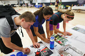 Liberty University students sign up for Live Healthy Liberty at Wednesday's Health Fair. 