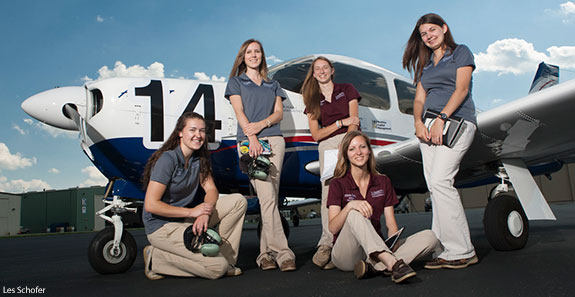Liberty Belles flight team in front of one of the Piper Arrow 28s they will use.