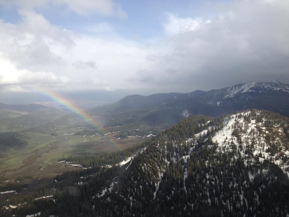 A rainbow is visible along the Teton Range in Wyoming on the first day of the Air Race Classic.