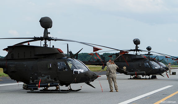 Military helicopters land at Lynchburg Regional Airport.