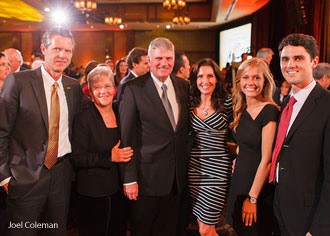 Jerry Falwell, Jr. and his family with Franklin Graham and his wife.