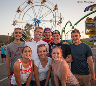 Students enjoy festivities from Block Party 2013 in the LaHaye parking lot. 
