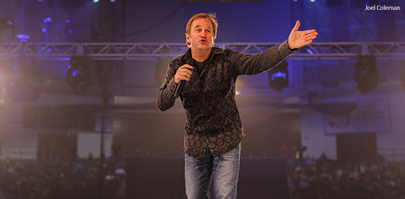 Comedian Brad Stine makes students laugh during Liberty University's Convocation on Feb. 23.