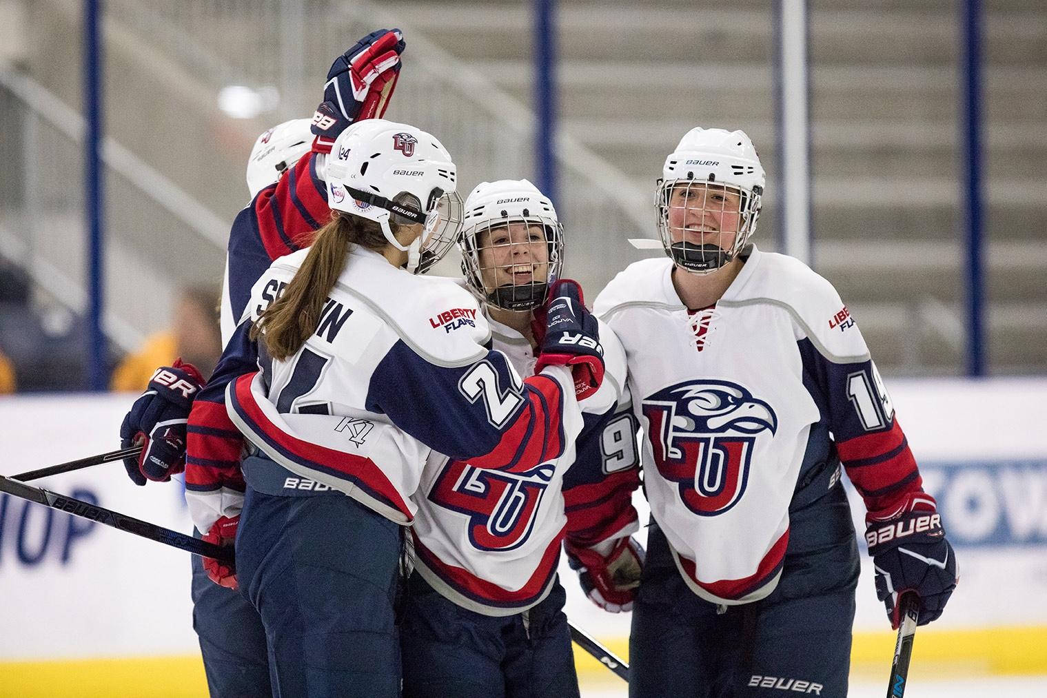 Players celebrate a goal in a Dec. 1 triumph over Grand Valley State. (Photo by Joel Isimeme)