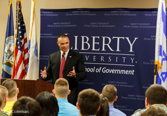 Dan Bongino, a former member of the Secret Service, spoke to students at the Helms School of Government.