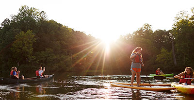 Students enjoy kayaking, canoeing, and stand-up paddleboarding at Hydaway Outdoor Recreation Center. (Photo by Joel Coleman)