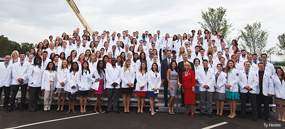 President Jerry Falwell and his wife with Liberty University's medical students.