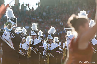 The Spirit of the Mountain plays a halftime show for the Liberty Flames Football team.