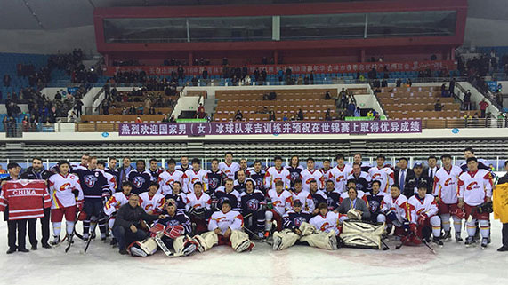 Liberty University's ACHA DI men's hockey team with a national team after a game in East Asia.