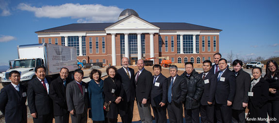 A delegation from China visits the construction site of Liberty University's Center for Medical and Health Sciences.