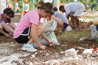 A Liberty student helps with disaster relief in the Philippines.