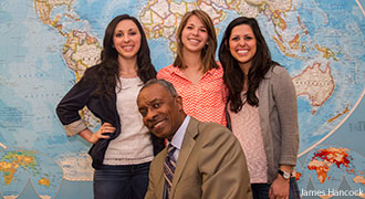 Dr. McFarland and three of his students.