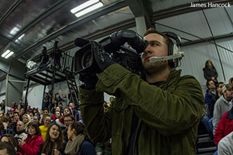 A Liberty student mans a camera during a broadcast.
