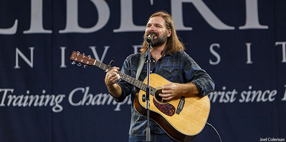 Mac Powell, lead singer of Third Day, performs at Convocation in the Vines Center.