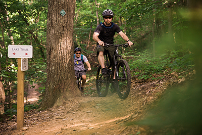 Mountain bikers approach Lake Trail on Thursday. (Photo by Kevin Manguiob)
