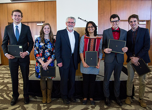 From left: Liberty University sophomore Blake Davis, junior Caroline Roberts, Provost Dr. Ronald Hawkins, senior Ruth Nair, junior Luis Quijano, and graduate student Connor Schonta