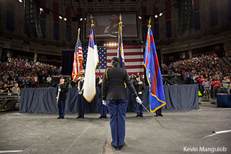 Liberty's ROTC color guard marches the flags into the Vines Center for the military appreciation Convocation.