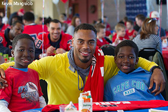 Rashad Jennings clowns with kids at Skills Camp at Williams Stadium.