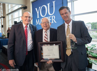 Dr. Paul Fink, longtime Liberty University School of Religion professor, with President Jerry Falwell, Jr. and Provost Ron Godwin at the univeristy's annual Years of Service banquet in July.