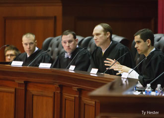School of Law alumni serve on a panel of judges for a moot court tournament on Saturday, March 22.