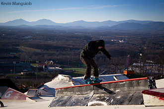 A snowboarder rides on the rails at the Liberty Mountain Snowflex Centre.