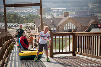 Liberty Mountain Snowflex Centre snow tube runners on family fun day.