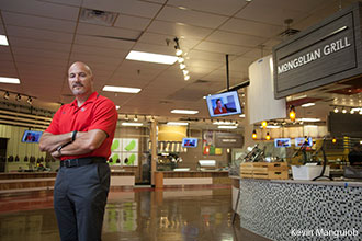 Louis Cambelette shows off the renovated serving stations at Reber-Thomas.