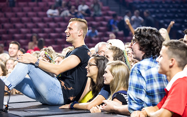 Steele Johnson poses with Liberty University students following Friday morning's Convocation. (Photo by Nathan Spencer)