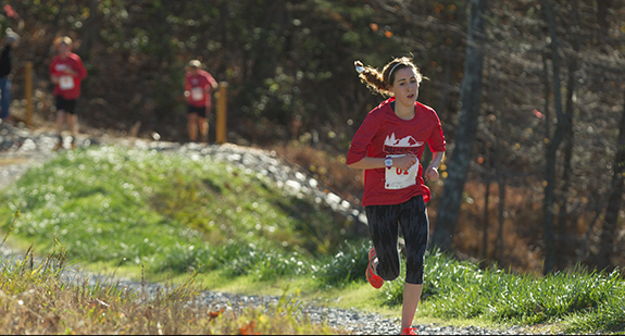 Runners in the Valley View Major Mike Donahue Memorial 5-Miler, one of six races in the Liberty Mountain Trail Series, round Hydaway Lake. (Photo by Mitchell Bryant)