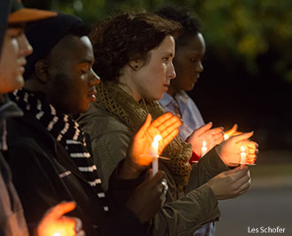 A candlelight vigil is held for Jon Gregoire on Monday, Nov. 10.