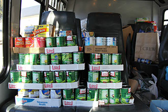 Liberty brings a large donation to the Blue Ridge Area Food Bank.