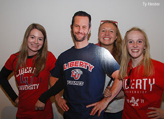 Liberty students pose with a cutout of Kirk Cameron during a premiere of Saving Christmas.