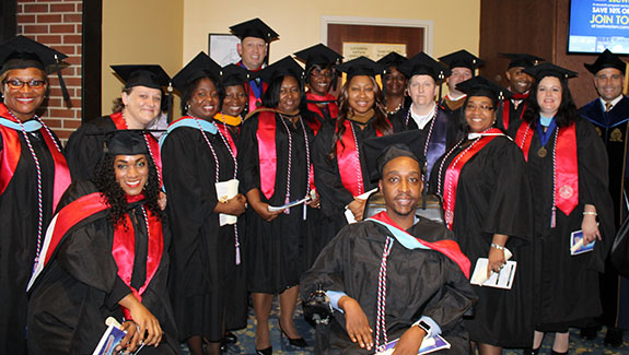 Liberty University graduates celebrate at the Fort Bragg Graduation Ceremony.