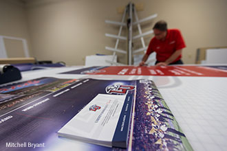 Signs for Athletics are created in Liberty's print shop.