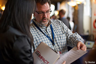 Church leaders meet with Liberty students during a career fair.