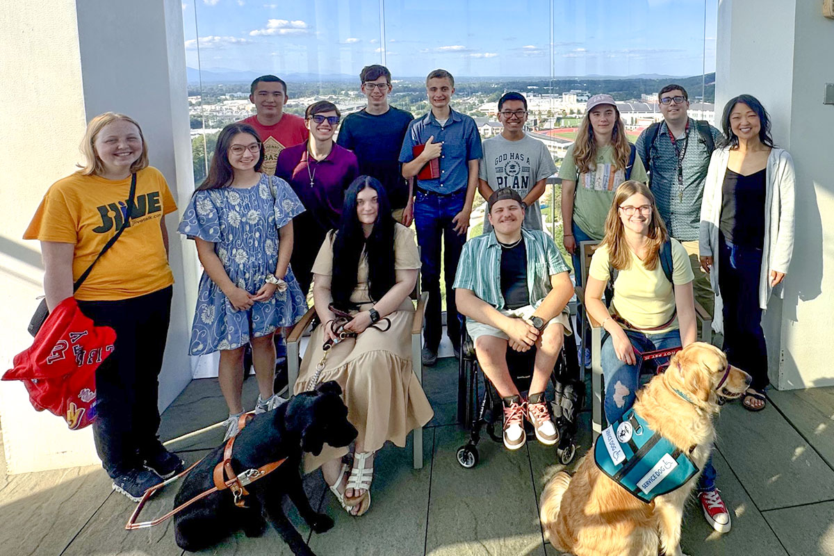 Warren (far right) with the 2025 Beyond Barriers group at Freedom Tower