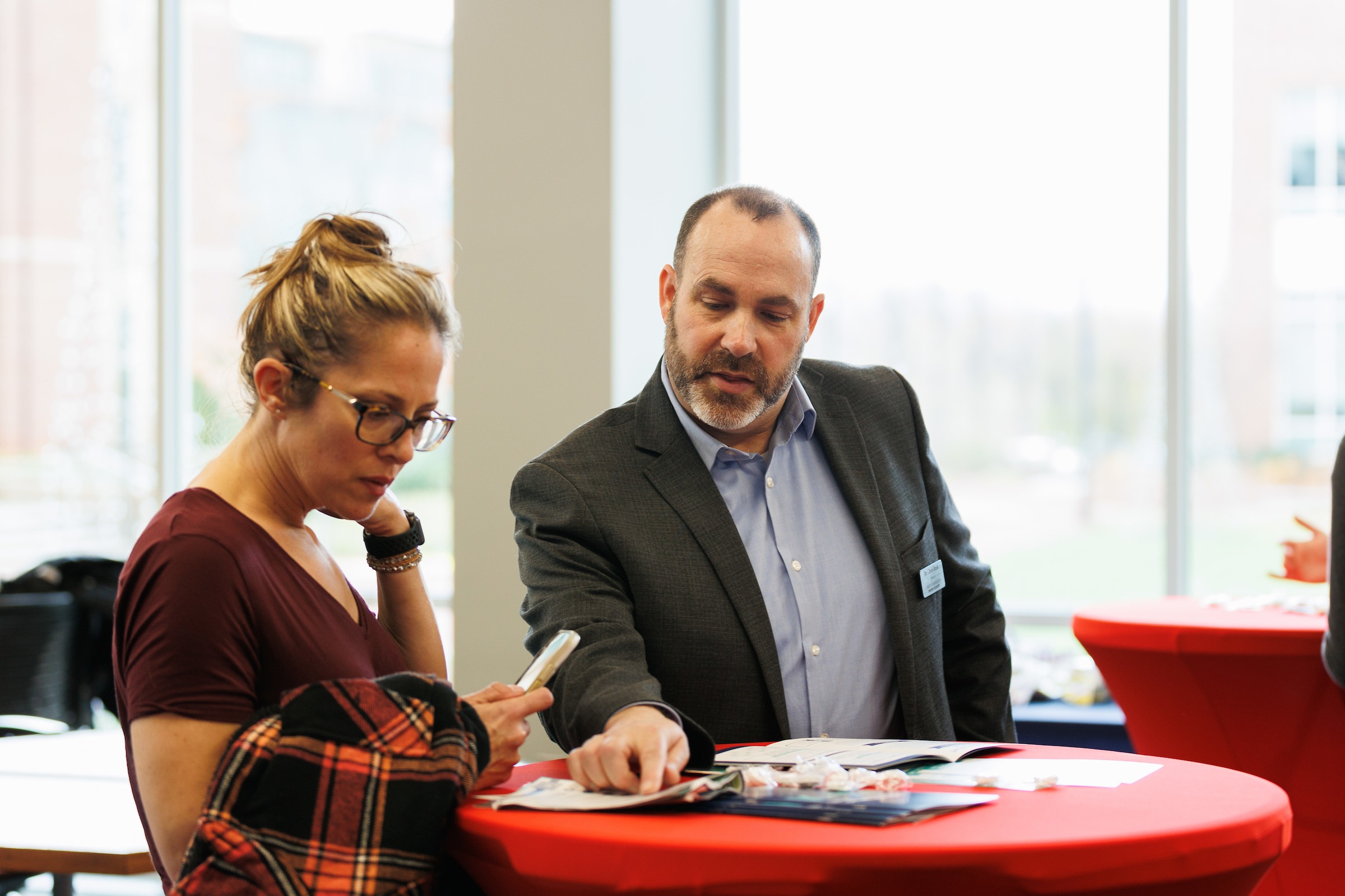 LUOA staff answering questions for parent