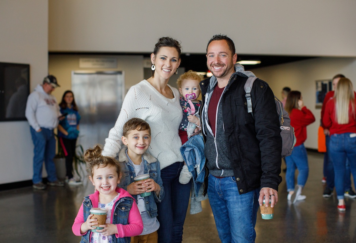 Family smiling during the LUOA Christmas Party