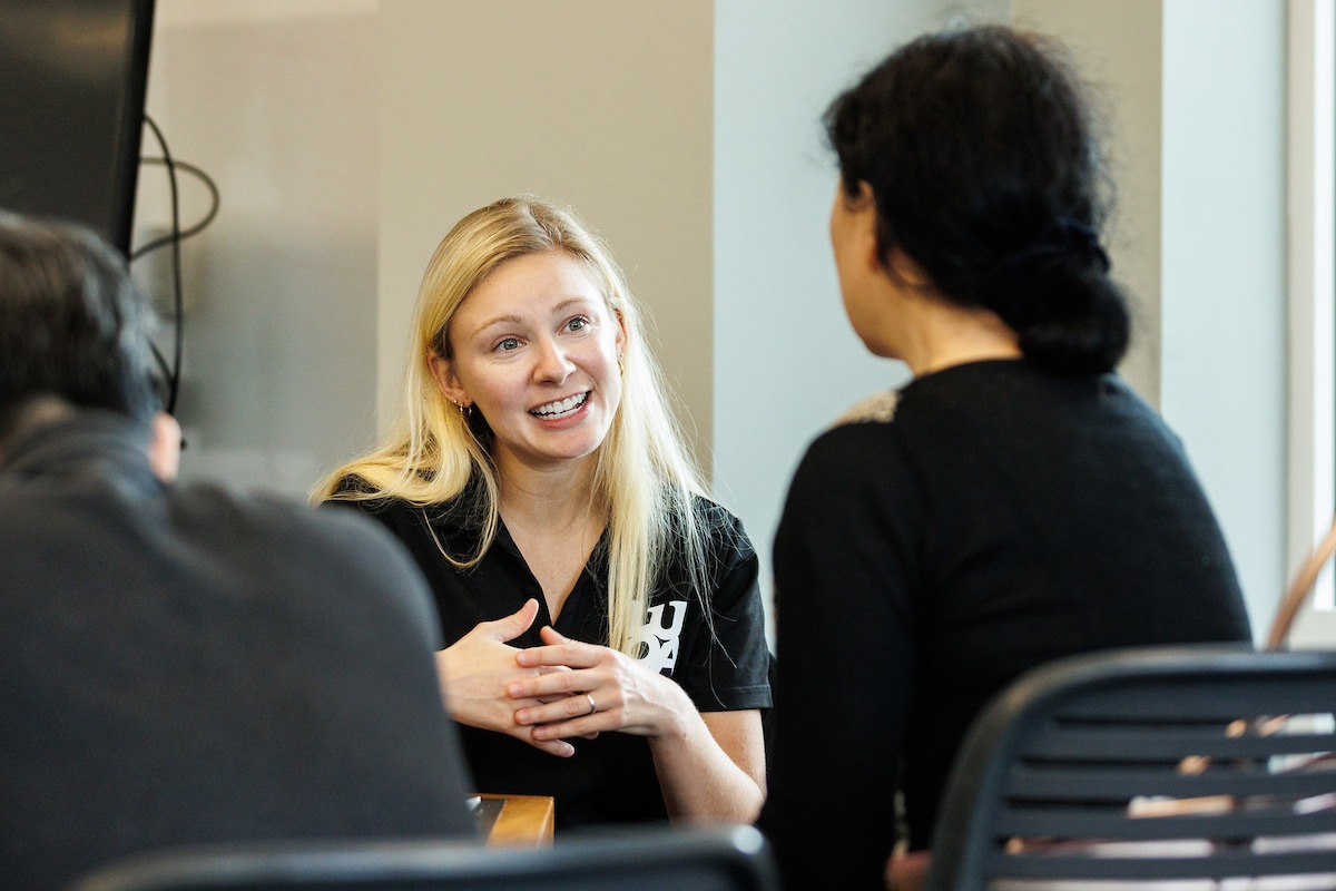 LUOA faculty/staff meeting with parents/students during an Open House