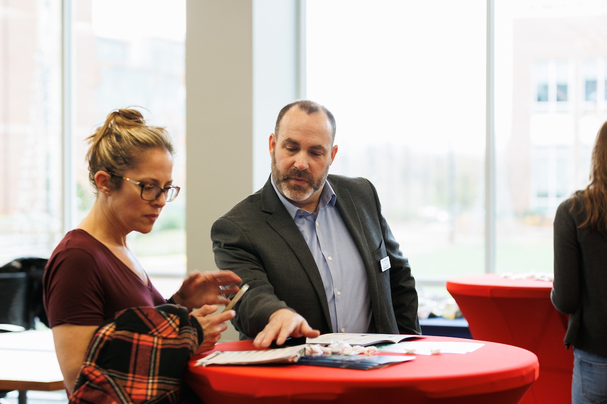 LUOA faculty/staff meeting with parents/students during an Open House