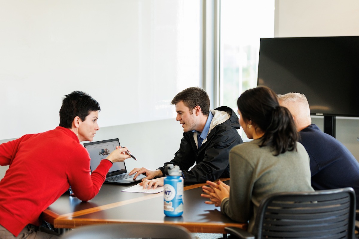 LUOA faculty/staff meeting with parents/students during an Open House