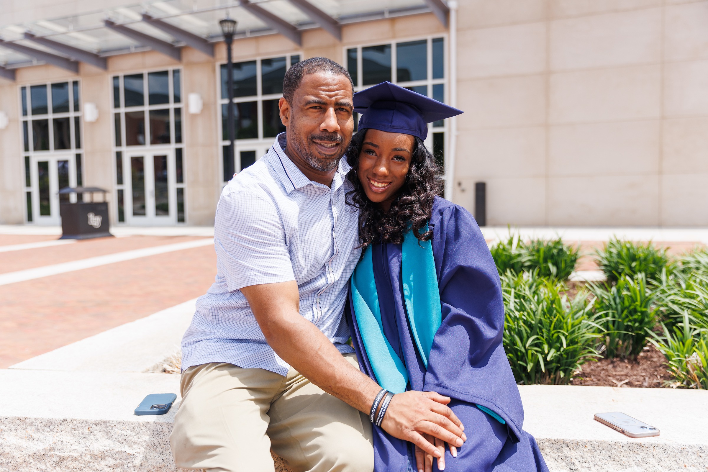 Dad and daughter at LUOA graduation festivities