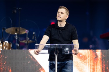 Josh Rutledge speaking at LUOA Chapel