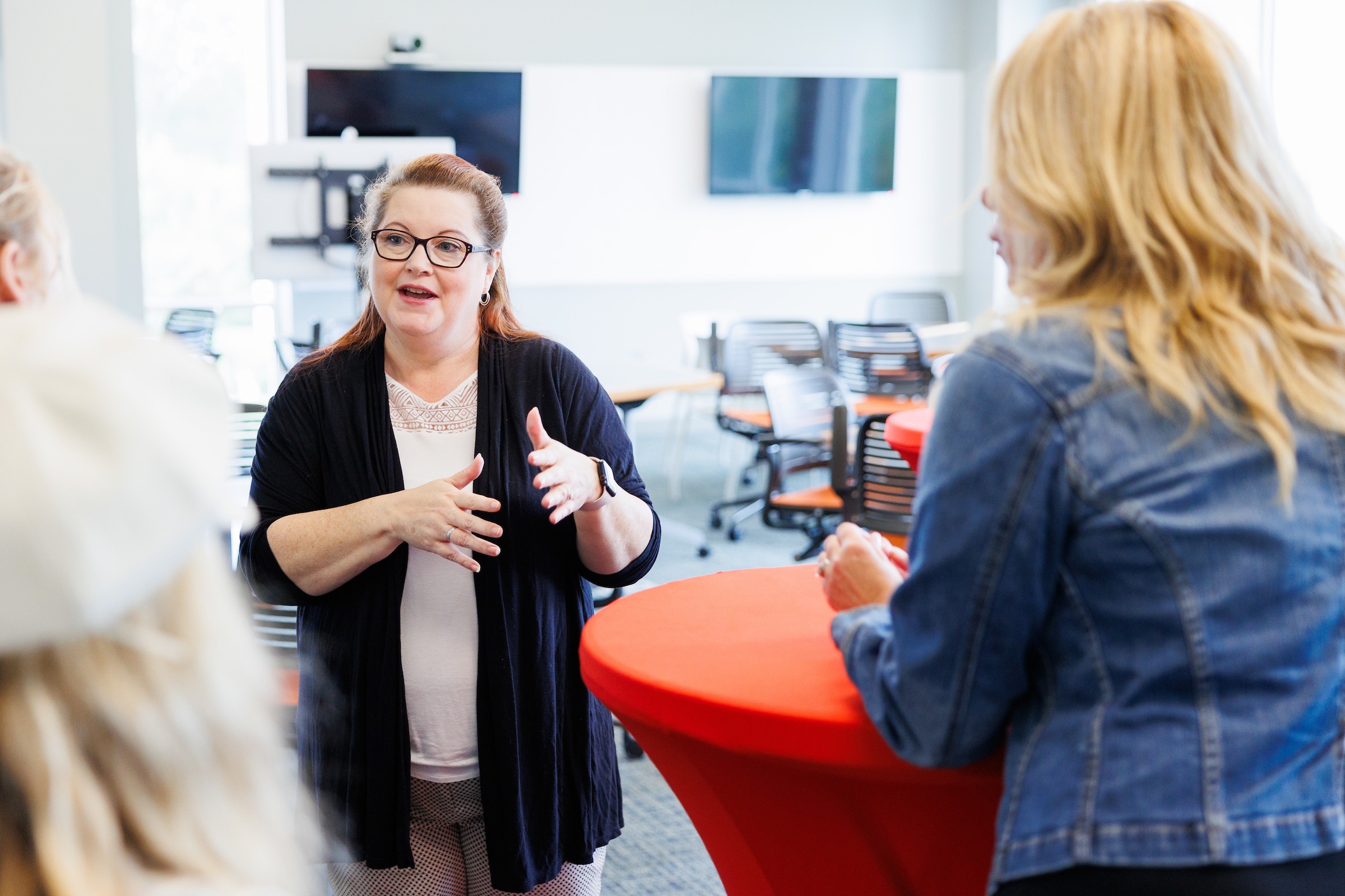 LUOA faculty/staff meeting with parents/students during an Open House
