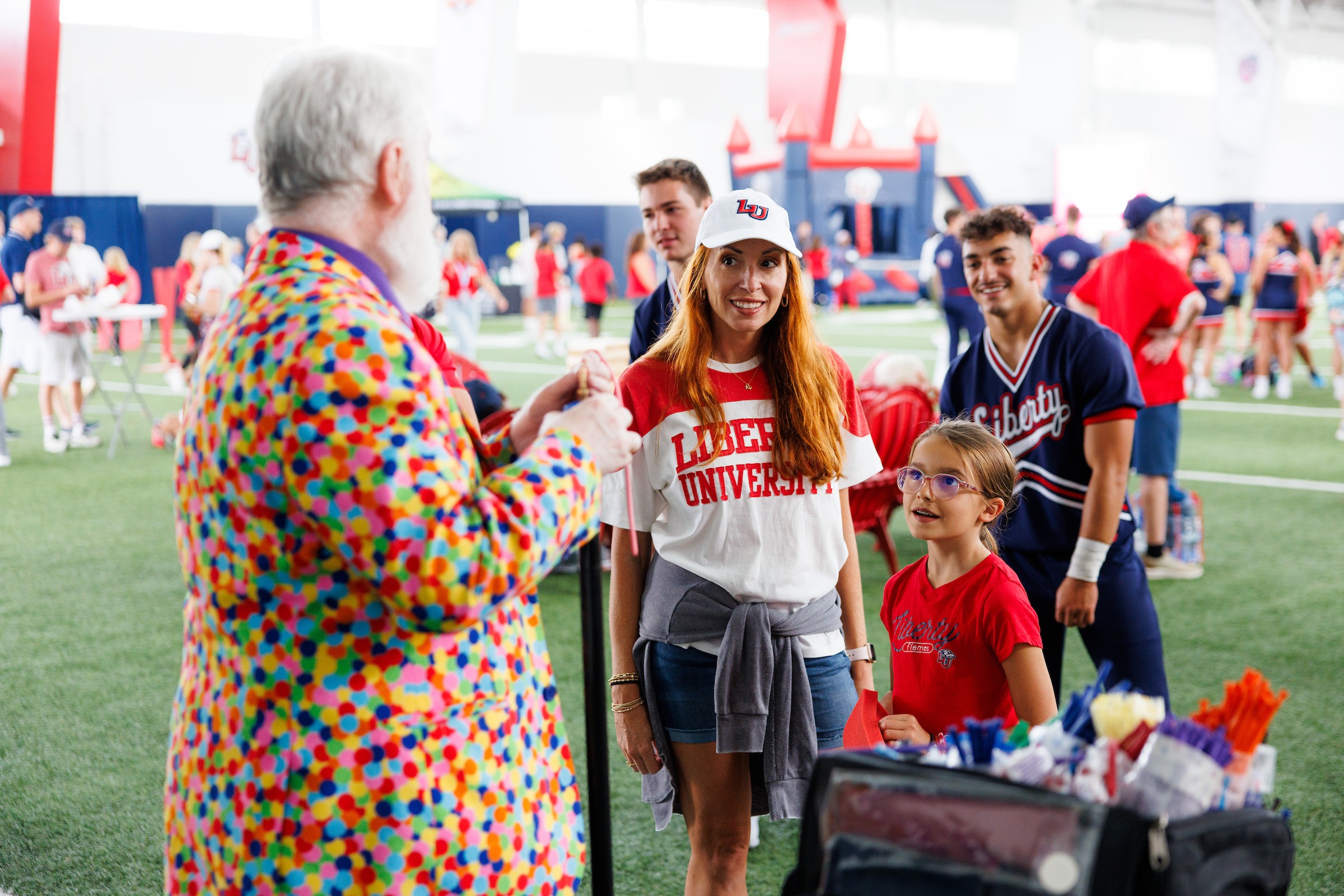 Families participating in activities at the LUOA tailgate