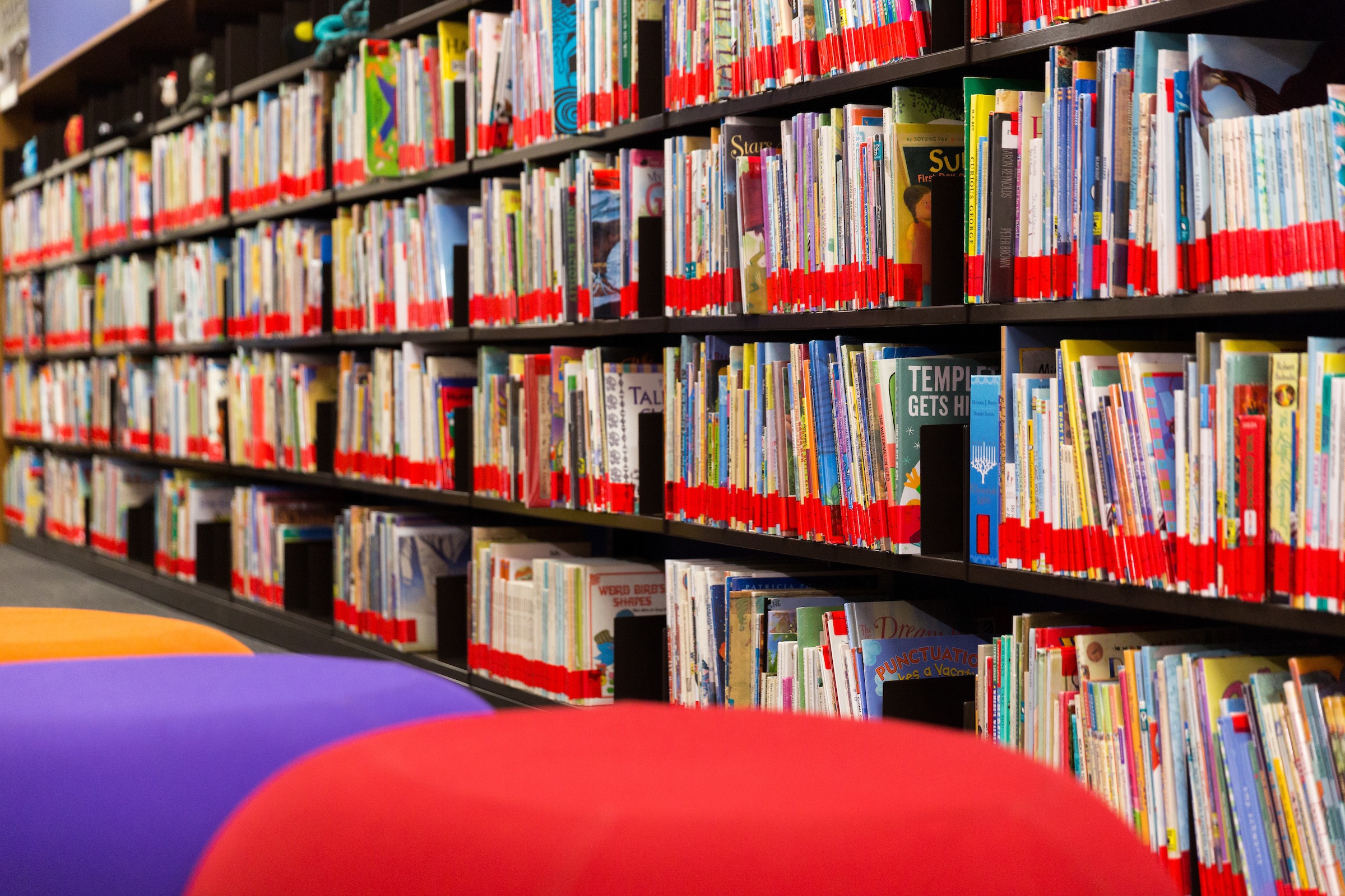 Shelves of children's books in a library